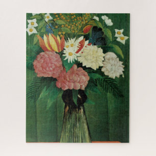 Blumen in einer grünen Vase