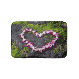 Blumen-Leu auf den Felsen Badematte