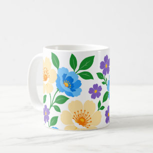 Blumendesign mit blauen, cremefarbenen und violett kaffeetasse