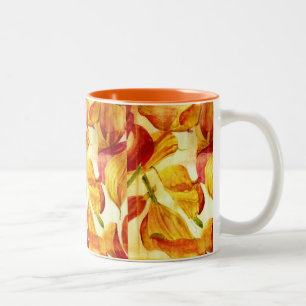 BLUMENentwurfs-TASSE DURCH MOJISOLA A GBADAMOSI Zweifarbige Tasse