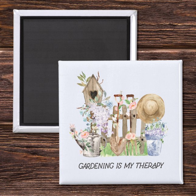 Blumengartenwerkzeuge und Angebot für Wasserfarben Magnet (Close up on wood)