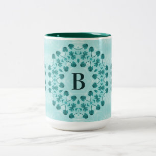 Blumenmuster, Aquamarin Blue Initial Zweifarbige Tasse