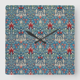 Blumenmuster auf grünen Blättern blauem Hintergrun Quadratische Wanduhr