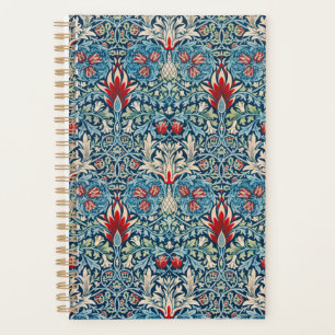 Blumenmuster auf grünen Blättern, blauer Hintergru Planer
