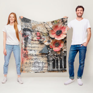 Blumenmuster mit rustikalen Klaviertasten und eine Fleecedecke