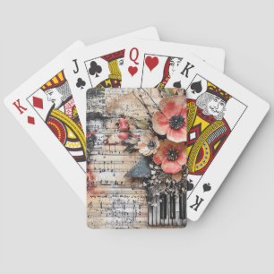 Blumenmuster mit rustikalen Klaviertasten und eine Spielkarten
