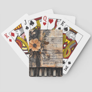Blumenmuster mit rustikalen Klaviertasten und eine Spielkarten