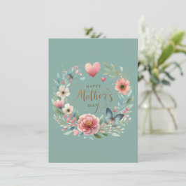 Blumenreath mit einem Schmetterlingstag zum Mutter Feiertagskarte