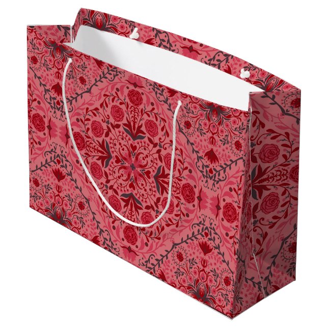 Blumenziegel in Rot und Wassermelone in Rosa Große Geschenktüte (Rückseite Schrägansicht)