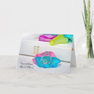 Blütenblätter und Ringe aus Regenbogen mit Rose Karte