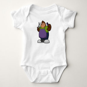 Body Gorilla comme coiffeur avec ciseaux et peigne
