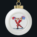 Bodybuilder Santa Funny Weihnachtsschmuck Keramik Kugel-Ornament<br><div class="desc">Weihnachtsschmuck mit Bodybuilder Weihnachtsmann mit Weihnachtsgeschenken - Cartoon Malerei Sammlung Weihnachtsschmuck - oder wählen / Fügen Sie Ihren einzigartigen Text / Name / Farbe - Make Your Special Gift - Umformen und verschieben oder entfernen und fügen Sie Elemente / Text mit Anpassungswerkzeug ! Malerei und Design von MIGNED. Bitte schauen...</div>