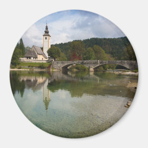 Bohinj See mit Kirche in rundem Magneten Magnet
