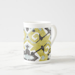 Boho-chic gelbes Ikat-Stammesmuster-Monogramm Prozellantasse