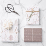 Boho Christmas Trees Falala Dusty Pink Holiday Geschenkpapier Set<br><div class="desc">Dieses niedliche Boho-Urlaubspapier bietet ein Set von 3 verschiedenen Designs von Verpackungspapieren. 1. Ein leicht staubiger rosafarbener Hintergrund mit Weihnachtsbäumen im Schatten von staubigen rosa. 2. Ein weißer Hintergrund mit falala in Schrift. 3. Heller Kastanienbraun mit Schneemodellen. Ändern Sie die Hintergrundfarbe und personalisieren Sie sie für Ihre Bedürfnisse. In meinem...</div>