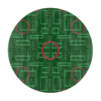 Boîtes géométriques sur la planche à découper vert