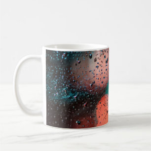 Bokeh-Fotografie von Wassertropfen auf klarem Glas Kaffeetasse