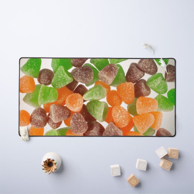 Bonbons de gomme rouge vert orange saupoudrés de s (Tableau pour enfants)