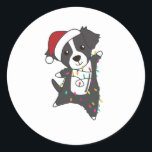 Border Collie Christmas Dog Winter Animals Dogs Runder Aufkleber<br><div class="desc">The border collie dog at Christmas with fairy lights. Funny animals with gifts and snow for the holidays. Also funny for Christmas in July. Dogs are cute animals and are perfect for Christmas.</div>