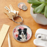 Border Collie Dog and Bold Pink Lilies Schlüsselanhänger<br><div class="desc">This keychain is a great gift or stocking stuffer and features a Border Collie sitting against a backdrop of big,  bold pink lilies in a botanical dog lover image.</div>