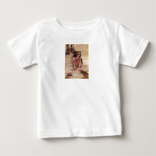 Border-Collie im Schnee auf dem T-Shirt des Kindes
