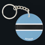 Botswana Flag Charming Patriotic Schlüsselanhänger<br><div class="desc">Botswana Flag Charmanter Patriotischer Schlüsselanhänger mit der Botswanaflagge auf dem Schlüsselanhänger gedruckt. Ländername in subtil in das Design am unteren Rand integriert. Der Text kann mit der Funktion "Anpassen!" vollständig angepasst werden. Dieser wunderschöne Botswana Schlüsselanhänger ist das stilvolle Geschenk für jeden Anlass. © CountriesOfTheWorld</div>