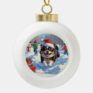 Boule En Céramique Japanese Chin courant dans la neige avec un chapea