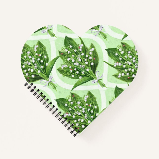 Bouquet der Lilie des Tales Blume auf grün Notizbuch (Vorderseite)