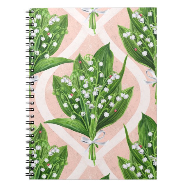 Bouquet der Lilie des Tals Blume auf rosa Notizblock (Vorderseite)