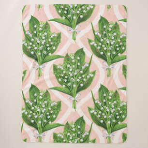 Bouquet der Lilie des Tals Blume auf rosa Sherpadecke