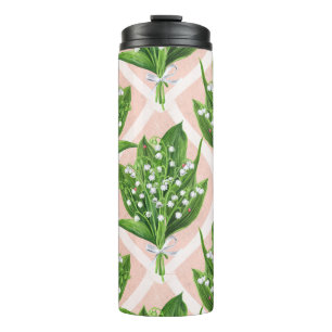 Bouquet der Lilie des Tals Blume auf rosa Thermosbecher