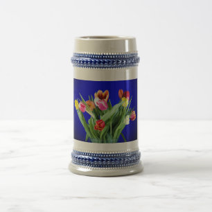Bouquet of tulips on blue bierglas