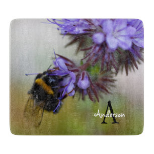 Bourdon sur une planche à découper en verre Blue T