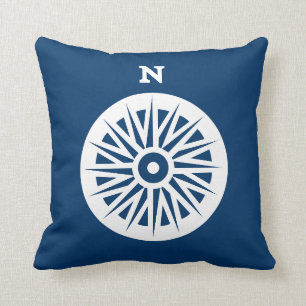 boussole marine blanche sur turquoise coussin mari