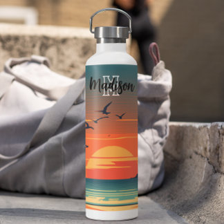 Bouteille D'eau Coucher de soleil coloré sur l'océan