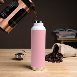Bouteille d'eau en acier inoxydable rose isolée