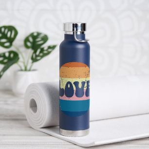 Bouteille D'eau Typographie D'Amour Rétro Sur Les Rayures De Couch