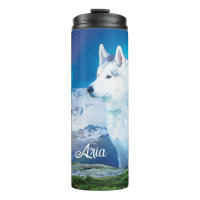 Chien Husky avec montagnes et aurores boréales