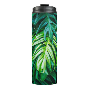 Bouteilles Isothermes Feuilles verts tropicaux sur arrière - plan sombr