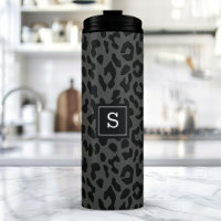 Motif imprimé animal léopard gris monogrammé