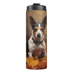 Bouteilles Isothermes Rat Terrier dans les feuilles d'automne qui tomben