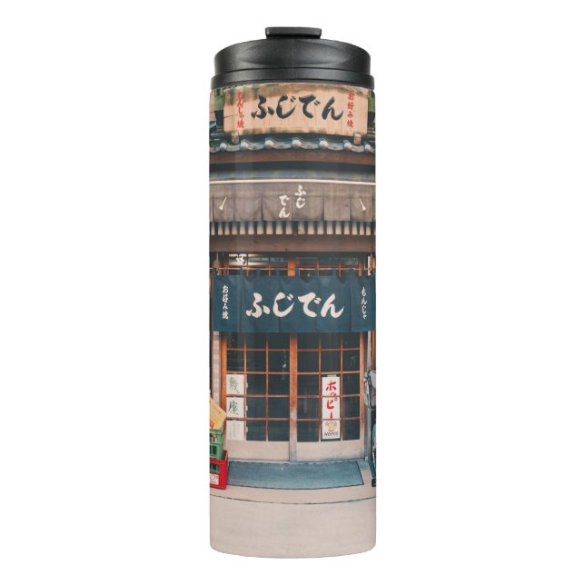 BOUTEILLES ISOTHERMES TROIS BICYCLETTES PARKÉES DEVANT L'ÉDIFICE (Devant)