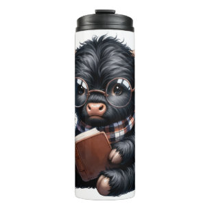 Bouteilles Isothermes Vache Highland noire lisant un livre