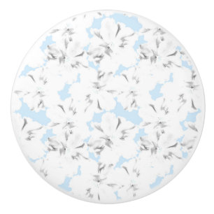 Bouton De Porte En Céramique Fleurs blanches sur bleu clair.