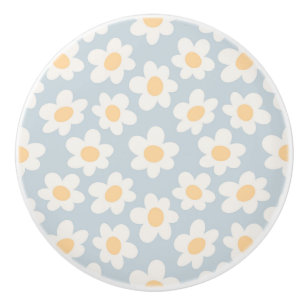 Bouton De Porte En Céramique Fleurs de style rétro sur arrière - plan bleu