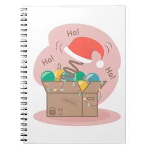 Boxbox mit Weihnachtsdekoration und Weihnachtsmann Notizblock