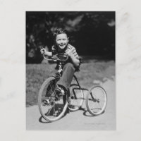 Boy Riding Tricycle