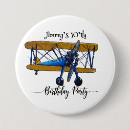 Boys birthday party with blue and yellow biplane button