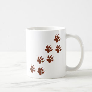 braune Auflage vollzieht Ikone nach Kaffeetasse