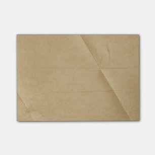 Braune cremefarbene gefaltete faltige Hintergrundb Post-it Klebezettel